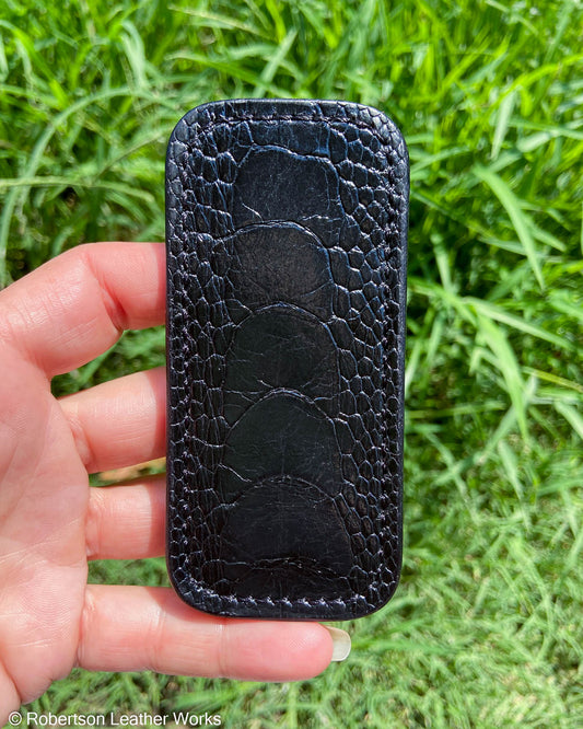 Small Black Glazed Ostrich Leg Leather Knife Slip, Black Stitching