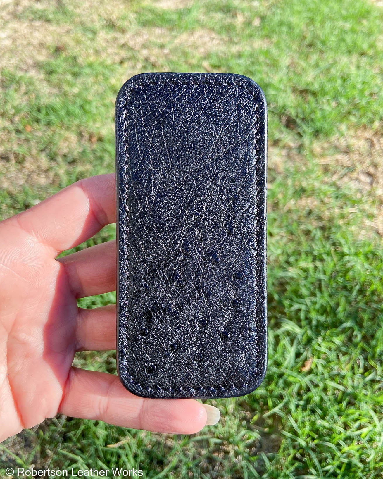 Medium Black Ostrich Leather Knife Slip, Black Stitching
