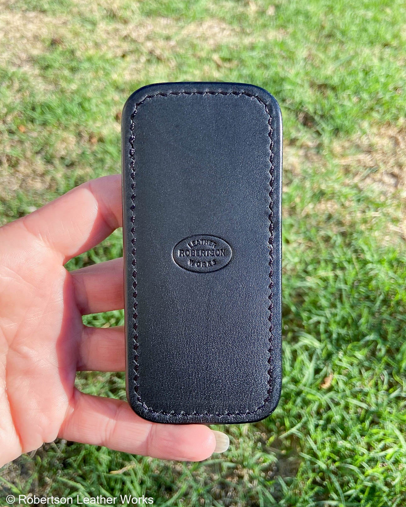 Medium Black Ostrich Leather Knife Slip, Black Stitching